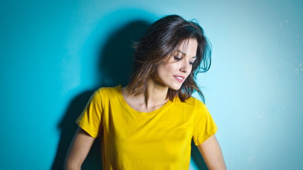 Woman in yellow shirt
